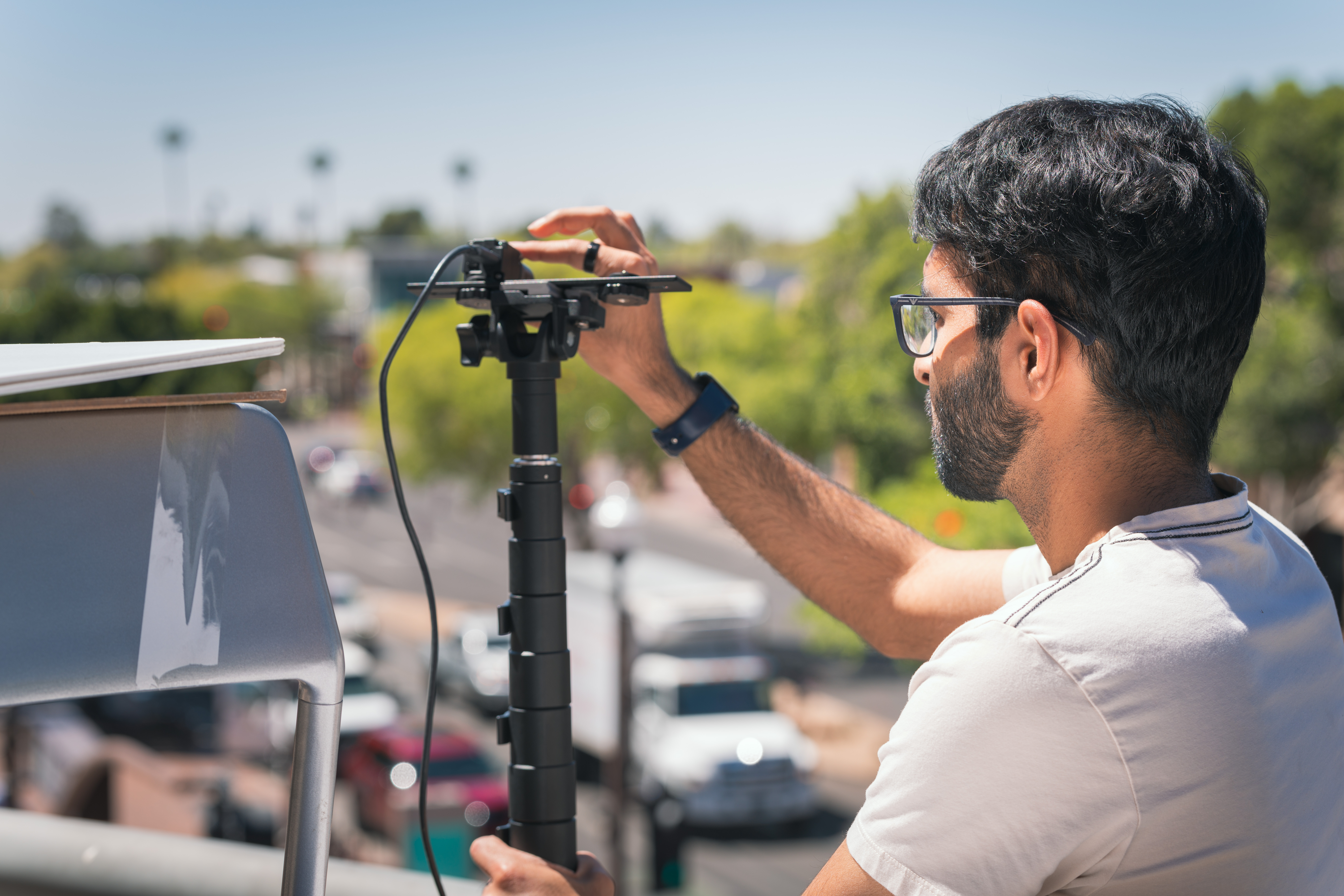 Research team member adjusting event camera