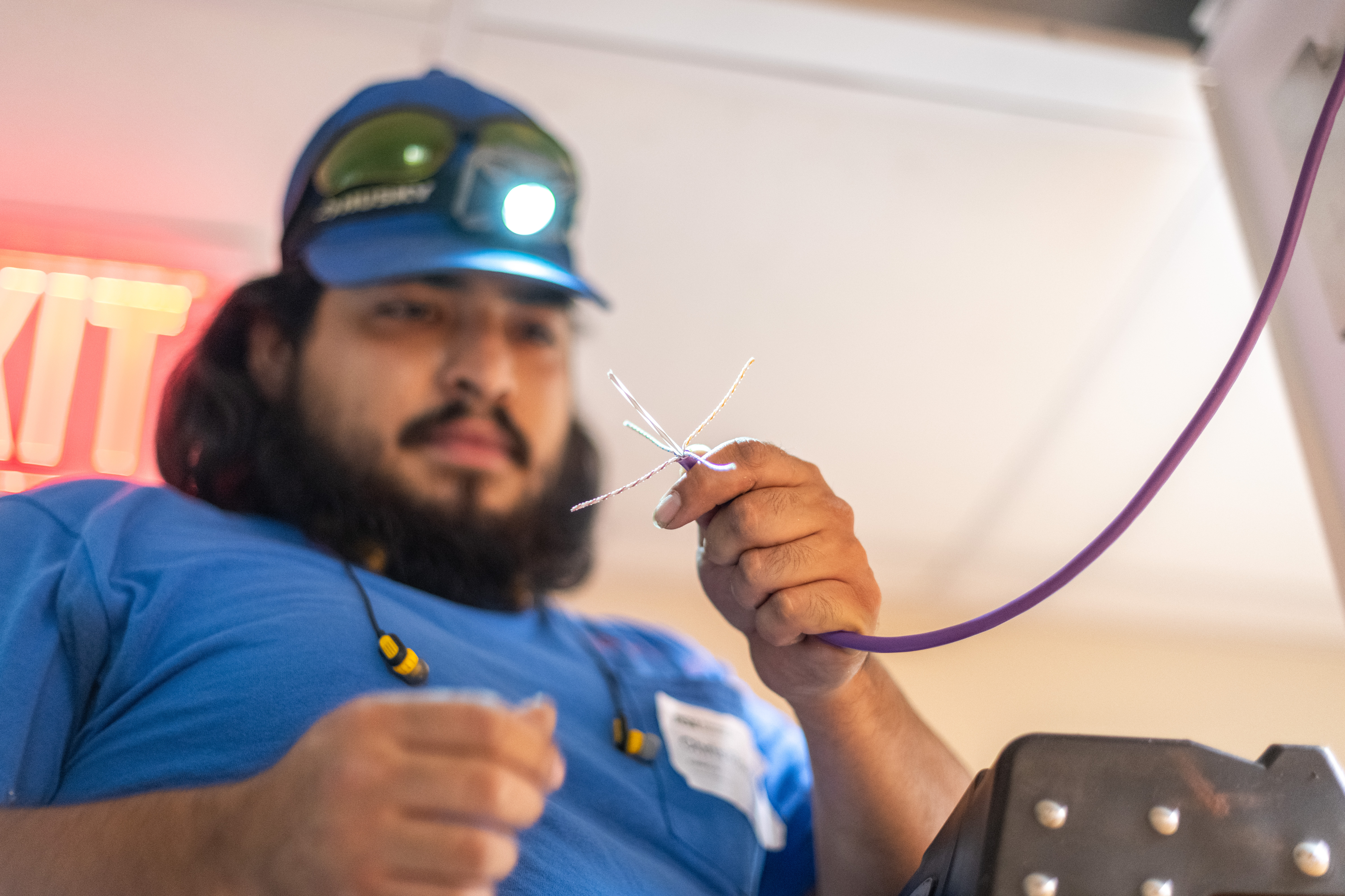 Worker installing the neutral host network.